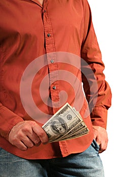 Casual man with few houndred dollars bills in the hand