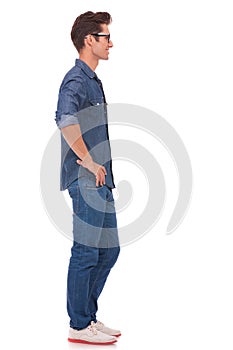 Casual man with hands on hips