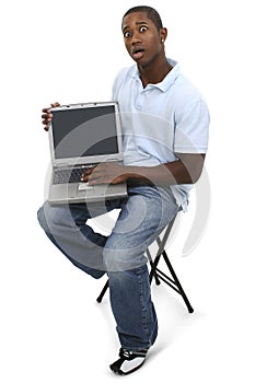 Casual Man with Laptop Computer and Shocked Expression on Face