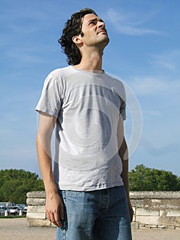 Casual man looking up