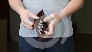 Casual Man Removes Wallet With No Money