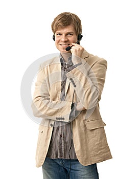 Casual man standing talking on headset