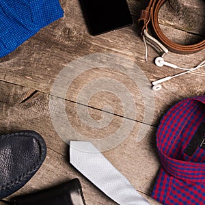 Casual mens fashion and outfits on the wooden table, flat lay, top view. square