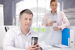 Casual office workers having break