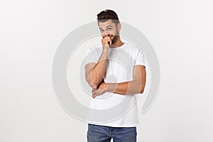 Casual portrait of happy university student guy standing with arms folded, laughing