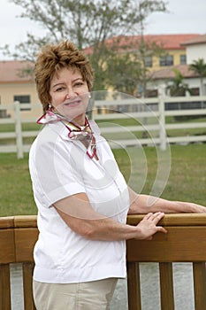 Casual smiling middle aged woman