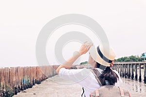 Casual style woman traveling seaside. Healthy lifestyle concept