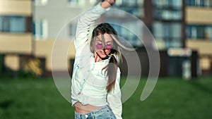 Casual summer woman street dancer performing dance at downtown. Shot on RED Raven 4k Cinema Camera