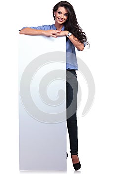 Casual woman with a blank board