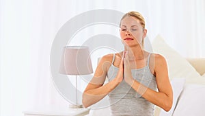 Casual woman doing yoga