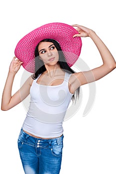 Casual woman in pink straw hat