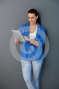 Casual woman with touchscreen computer