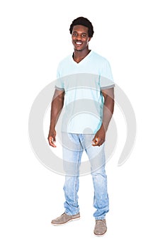 Casual young african man posing in front of camera