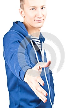 Casual young man giving a handshake