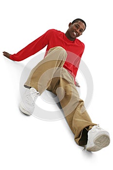 Casual Young Man in Khakis and Long Sleeve Red Shirt photo