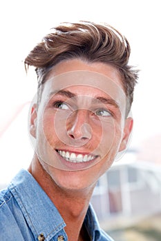 Casual young man smiling