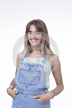 Casual young woman smiling against white background