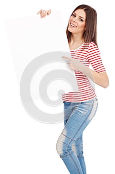 Casual young woman holding a white board