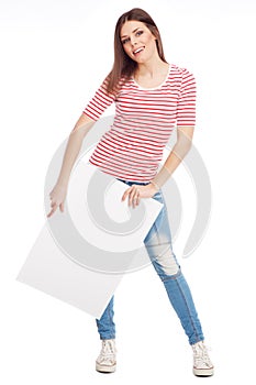 Casual young woman holding a white board