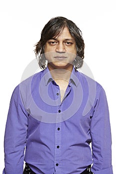 Casually dressed asian man pensive