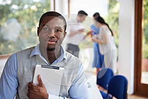 Casually Dressed Businessman Attending Meeting In Boardroom photo