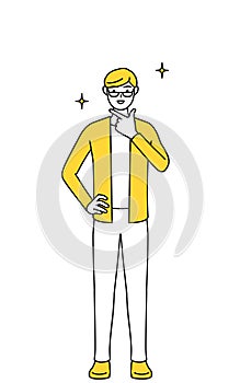 A casually dressed young man in a confident pose