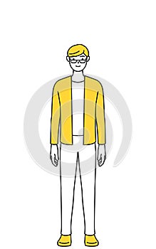 A casually dressed young man, standing