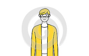 A casually dressed young man, standing