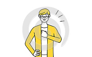 A casually dressed young man tapping his chest