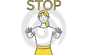 A casually dressed young woman with her hand out in front of her body, signaling a stop