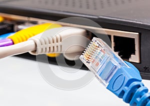 Cat 5 cables in multiple colors in router