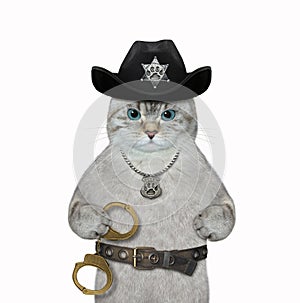 Cat ashen cop holds handcuffs