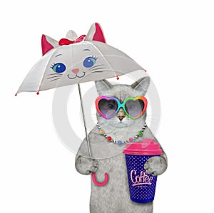 Cat ashen under umbrella drinks coffee