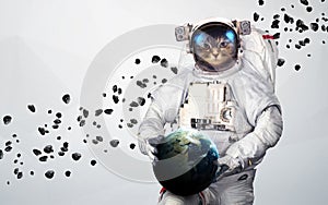 Cat Astronaut in outer space modern art. Elements of this image furnished by NASA.