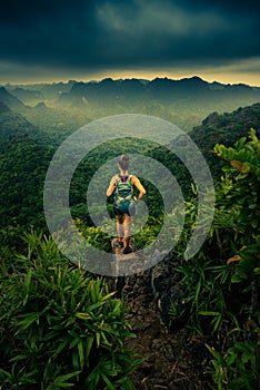 Cat Ba National Park Top of the Hill Young Woman enjoys beautiful view from the Ngu Lam peak in Kim Giao forest