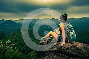 Cat Ba National Park Top of the Hill Young Woman enjoys beautiful view from the Ngu Lam peak in Kim Giao forest