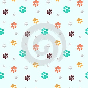 Cat and dog paw pattern. Seamless design. Colorful paws. Vector illustration.