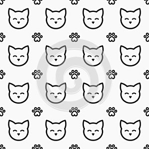 Cat faces and paws seamless pattern