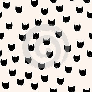 Cat faces seamless pattern. Black and beige vector background. Sipmle pet graphics