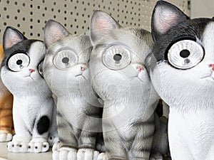 Cat figurines with flashlights