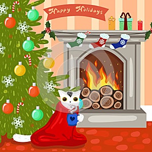 A cat by the fireplace and a Christmas tree