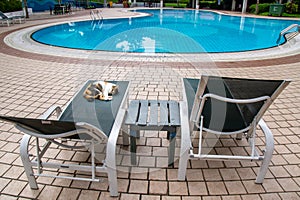 Cat lazing in the afternoon at a swimming pool