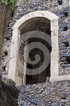 Cat looking from a mobile bridge from Monastery of Benedettini di San Nicolo L`Arena