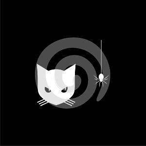 Cat looking at a spider icon or logo on dark background
