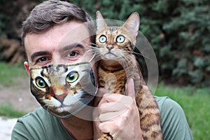 Cat lover wearing protective mask