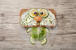 Cat made of bread and vegetables