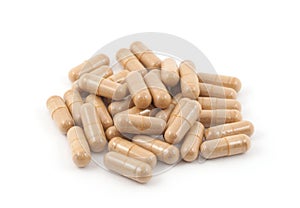 Cat`s Claw plant powder capsules  isolated on white