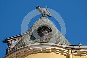 The cat sculpture on the roof of Cat House in Riga, Latvia