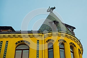 Cat statue on the roof. Detail of Cat House in the center of Riga, Latvia