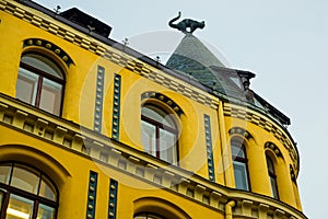 Cat statue on the roof. Detail of Cat House in the center of Riga, Latvia